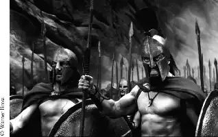 Description de l'image par IA : Deux guerriers spartiates, casqués et armés de lances, se tiennent côte à côte, prêts au combat.
