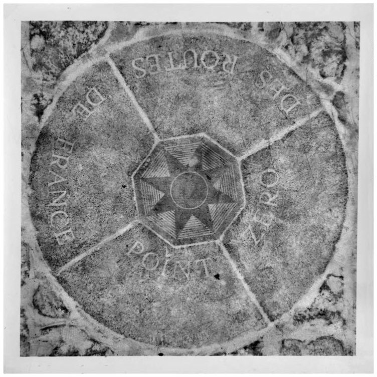Description de l'image par IA : Cercle avec inscriptions "FRANCE", "ROUTES", "POINTS" autour d'un octogone central.