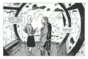 Description de l'image par IA : Deux personnes discutent à côté d'une grande machine circulaire. L'une tient un objet, l'autre montre quelque chose sur la machine.